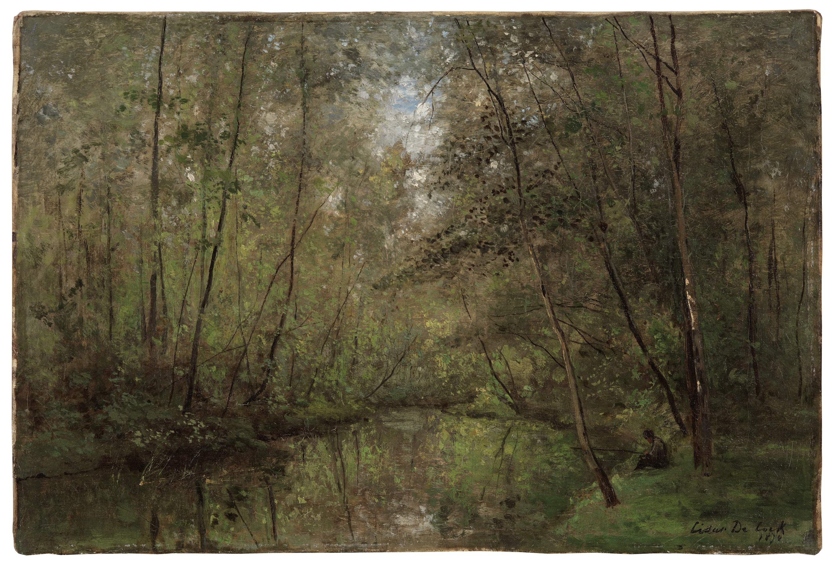 Fisherman near the forest river